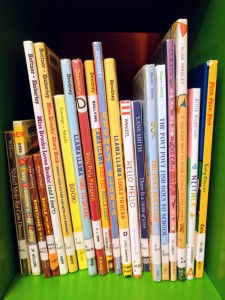 Picture books on green bookshelf